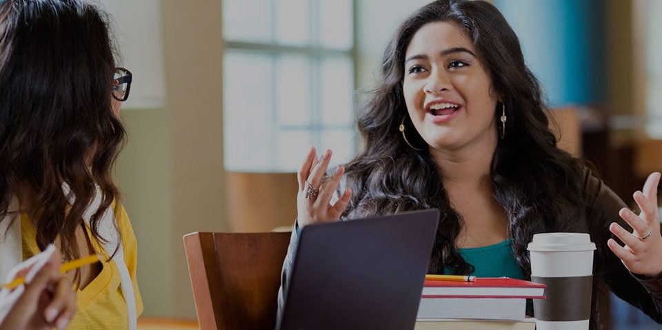 Photo of girls studying at a desk