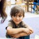 Photo of children sitting on the floor