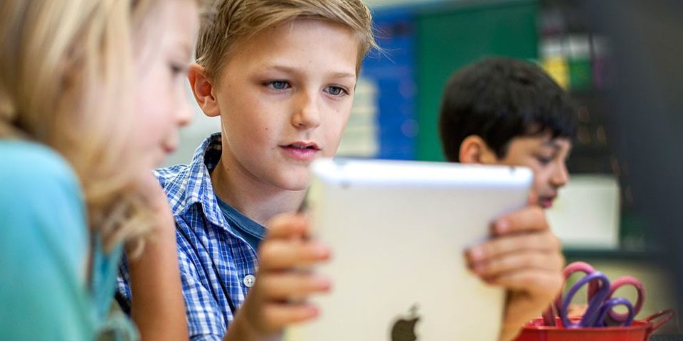 Photo of a boy with an iPad