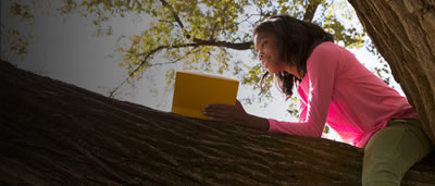 Photo of a girl in a tree