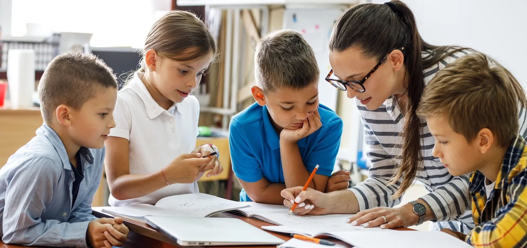 Teacher with school pupils